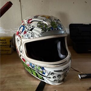 Icon White and Green Graphic Helmet